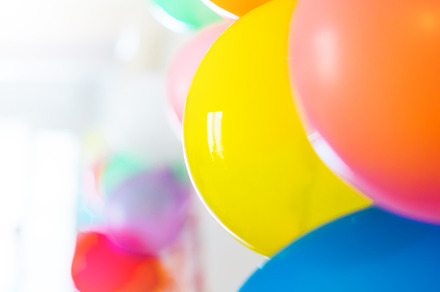 Multicolored balloons containing balloons, background, and birthday