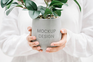 Woman Holding Gray Plant Pot Mockup