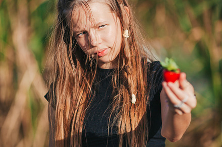 Cute teen beautiful girl having fun on tropical seashore, a Person Photo by travnikovstudio
