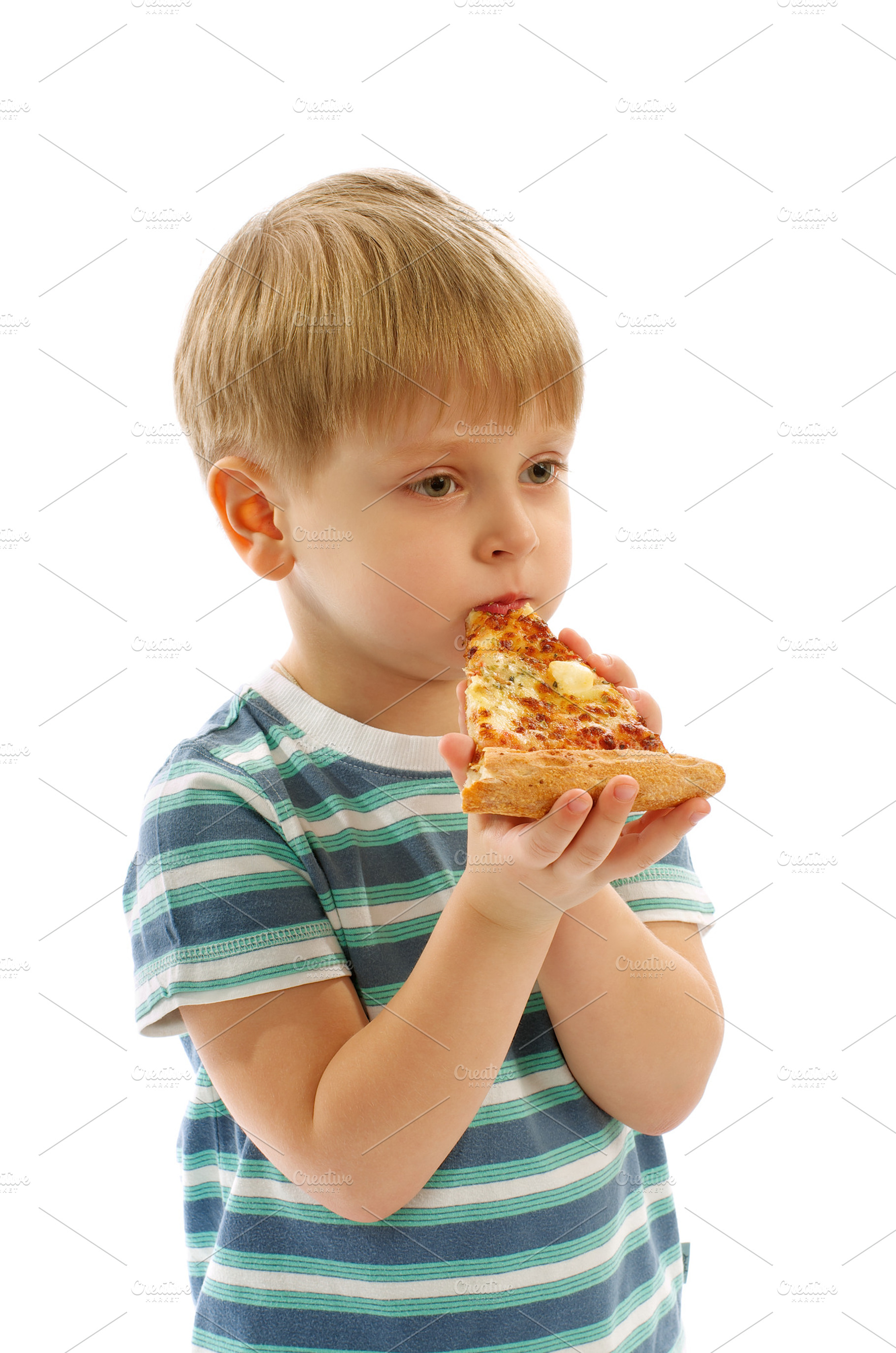 Little boy eating pizza featuring 3-4 years, babies and children, and blonde, a Person Photo by zhekos