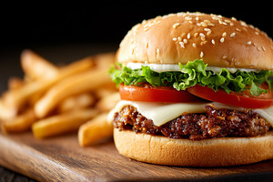 Juicy cheeseburger with beef patty, a Food & Drink Photo by MistyDay