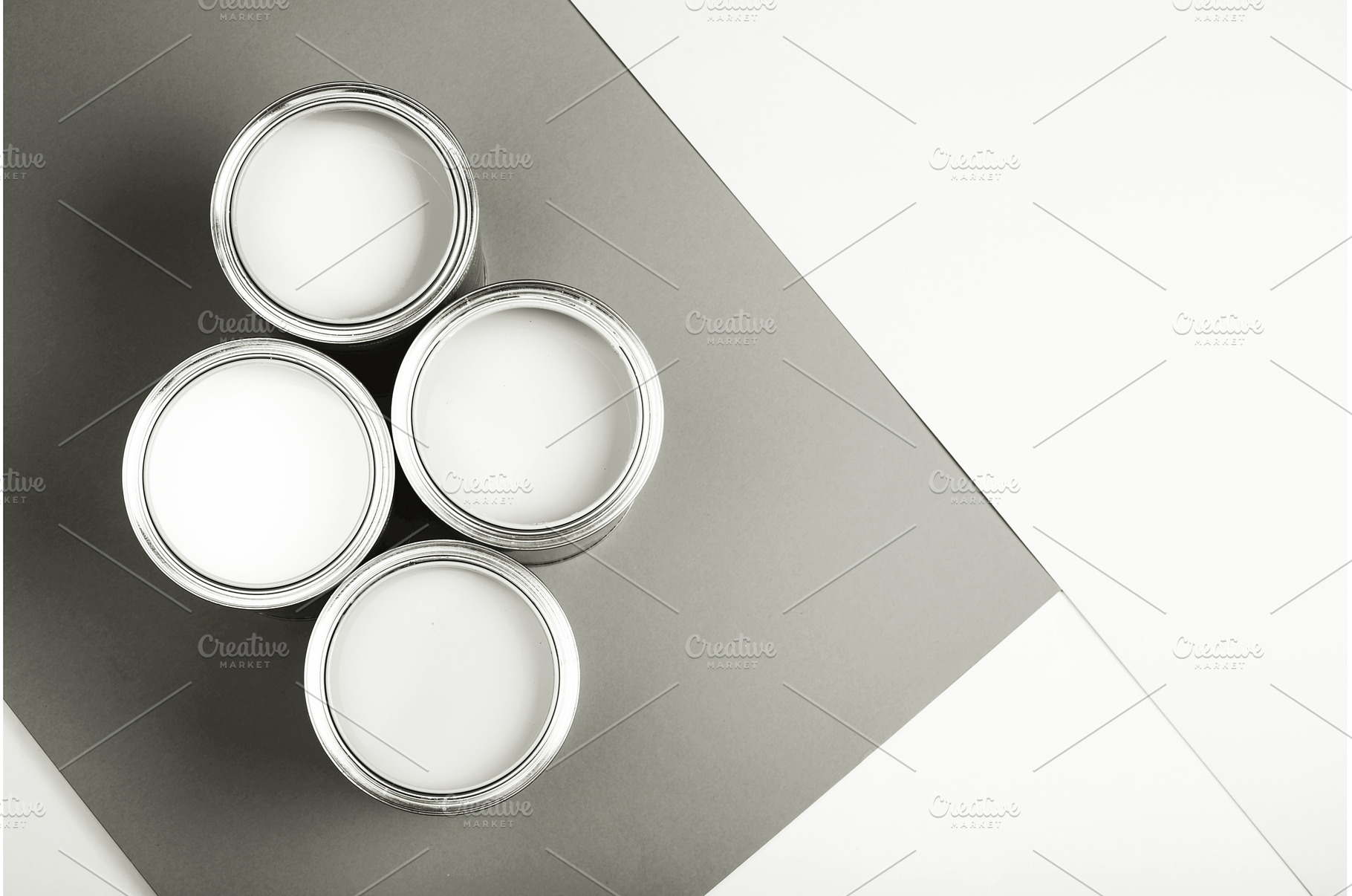White paint cans on monochrome, a Background Photo by Anna Efetova