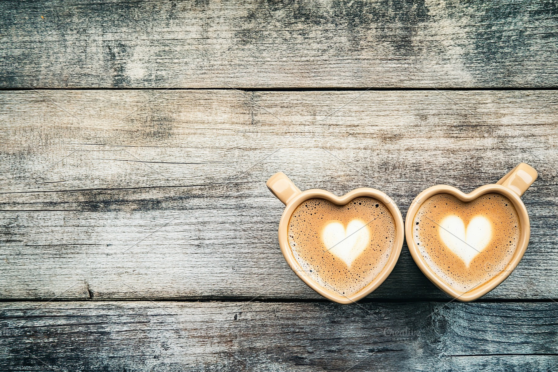 Two heart shaped cups of coffee, a Food & Drink Photo by AlyaAnd