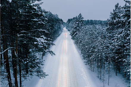 Night aerial view of snowy road, a Nature Photo by Fascinadora