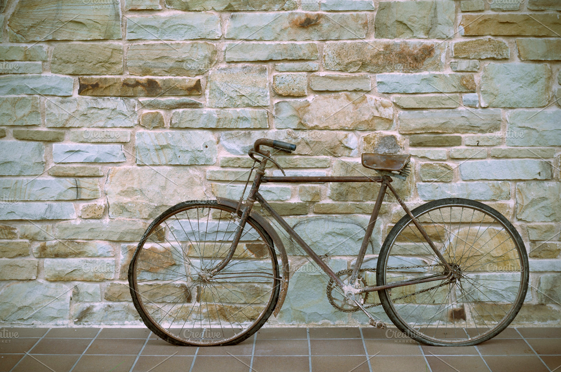 Antique or retro oxidized bicycle containing bike, bicycle, and outdoor, a Transportation Photo by Irantzu Arbaizagoitia
