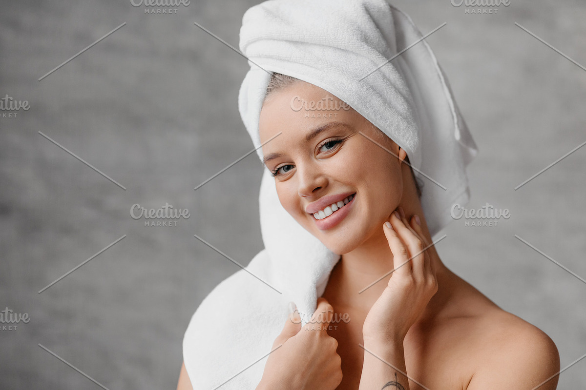 Home skincare concept. Portrait of pretty woman with perfect skin smiling at ca, a Photo by Prostock-Studio (Photo 2 of 2)