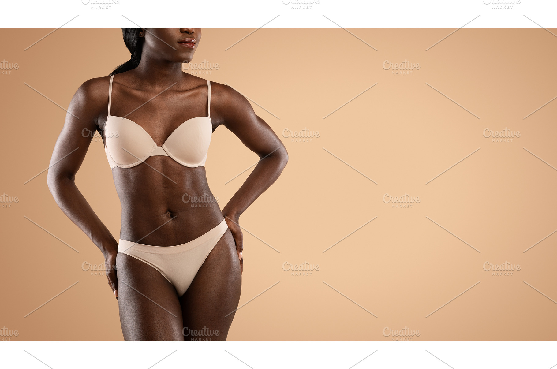 Cropped of black woman in underwear, a Person Photo by Prostock-Studio