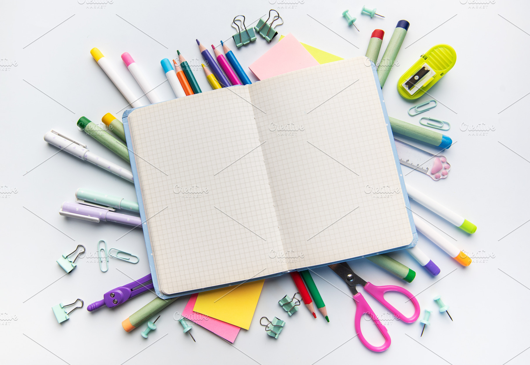 Open notebook with school supplies for education and creativity, a School & Education Photo by Olena Rudo