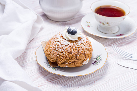 Piece of berry cake decorated with fresh berries on wooden backg, a Food & Drink Photo by MDBildes