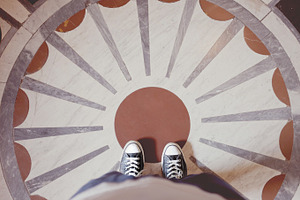 Standing on decorative pattern floor