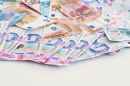Cash money foreign currency euro dollar hryvnia, a Business Photo by Photo Drive Studio