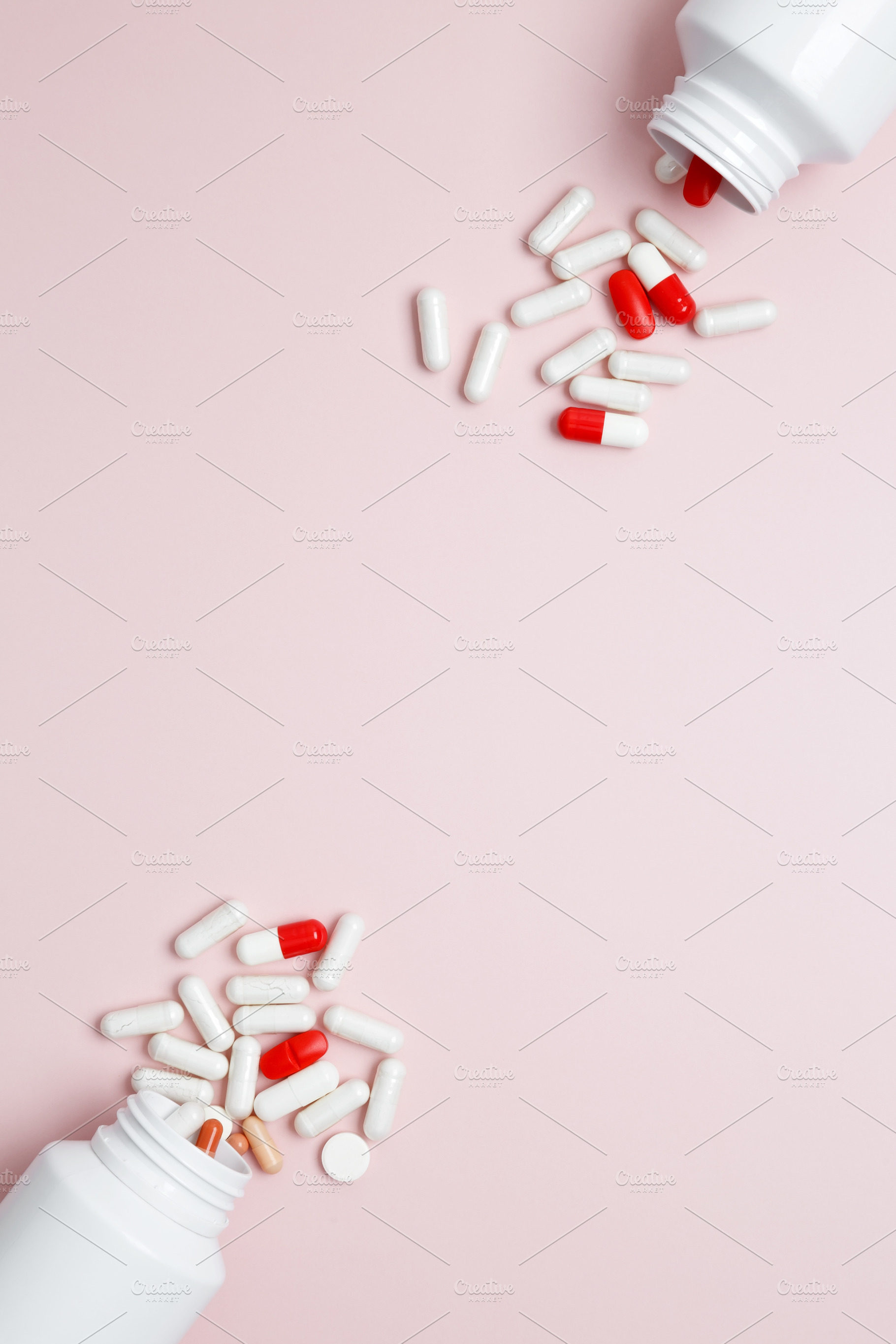 Concept of healthcare and medicine. White bottles container with colorful medic, a Photo by matucha