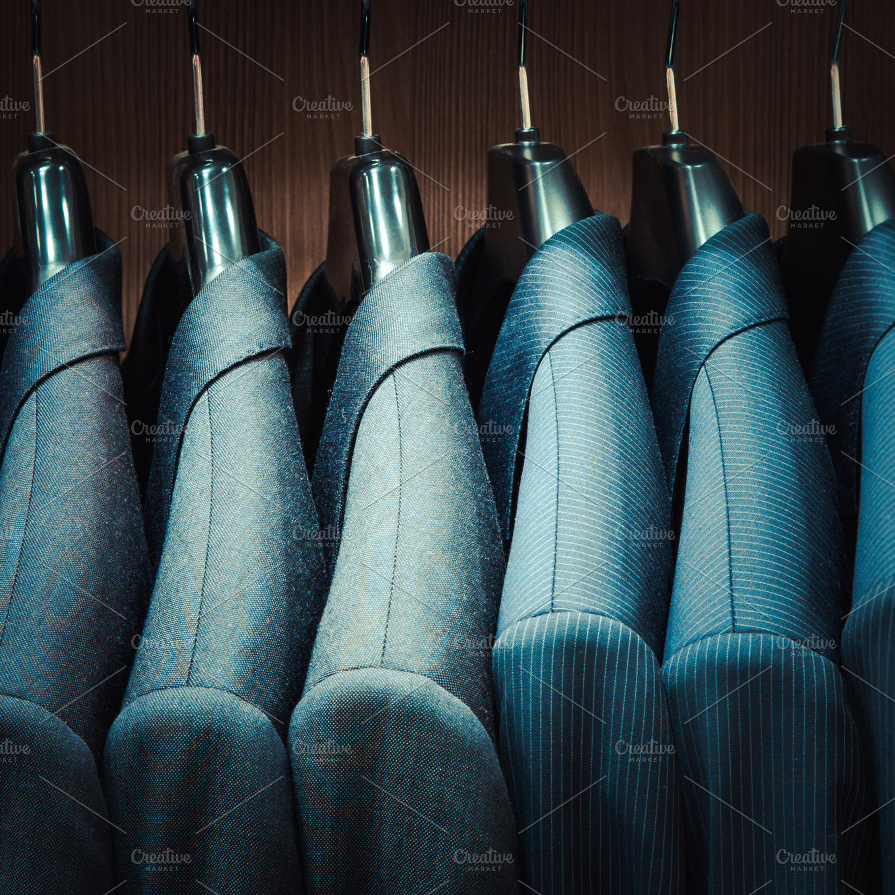Row of men suit jackets, a Beauty & Fashion Photo by chamillewhite