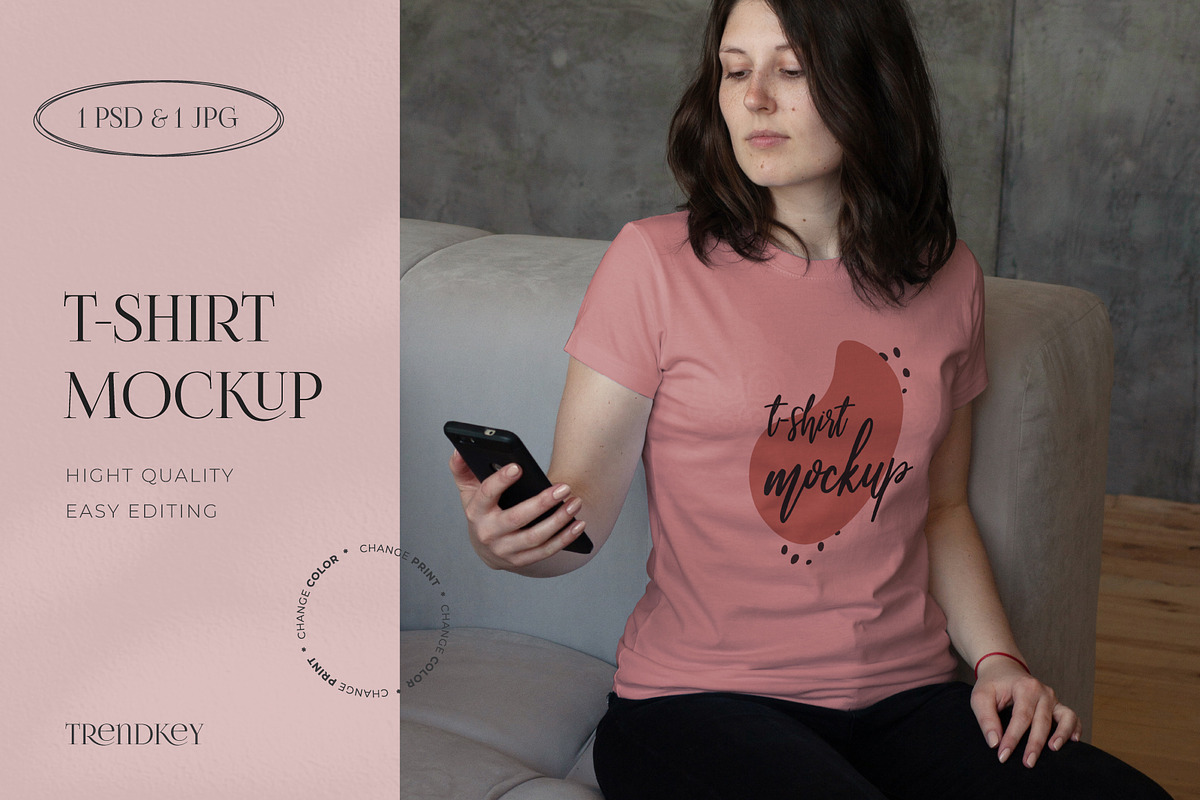 T-SHIRT MOCKUP MODEL WITH PHONE, a Shirt Mockup by TrendkeyMockups (Photo 1 of 4)