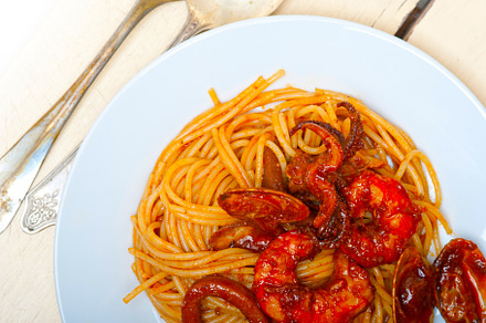 Italian seafood spaghetti pasta on red tomato sauce, a Food & Drink Photo by keko64