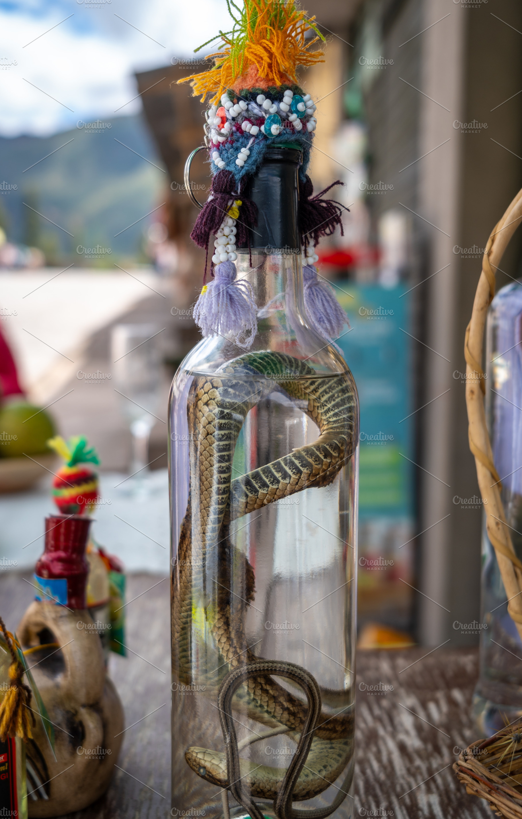 Alcohol bottle with a preserved snake in Peru, a Food & Drink Photo by GoodGoods