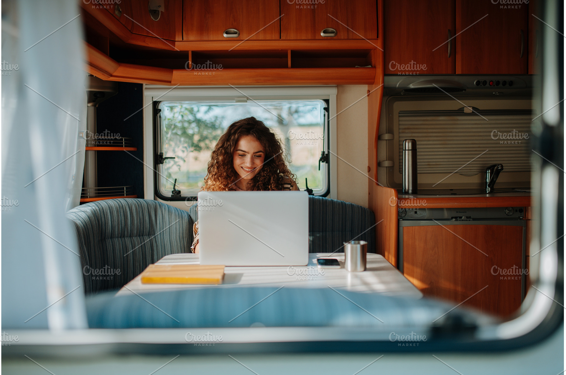 Young beautiful woman is camping in, a Person Photo by HalfPoint