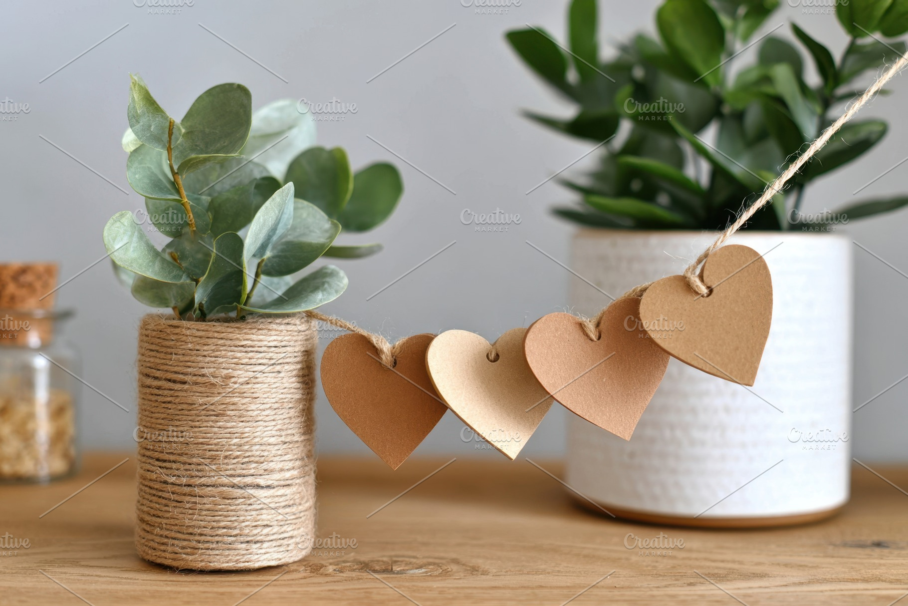 Decorative fabric heart garland in warm tones, a Holiday Photo by AlyaAnd