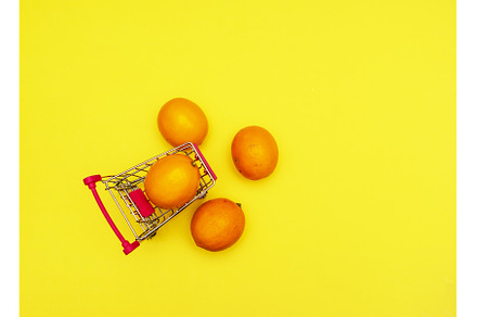 Oranges in an iron grocery cart on a, a Food & Drink Photo by shahin.mammadov