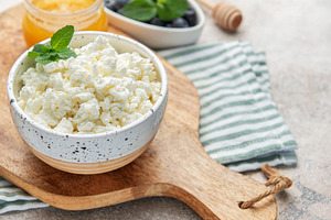 Cottage cheese bowl with mint, honey, and blueberries, a Food & Drink Photo by Olena Rudo