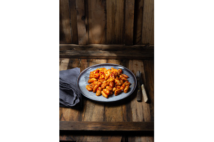 Italian potato Gnocchi with tomato, a Food & Drink Photo by LARISA BLINOVA