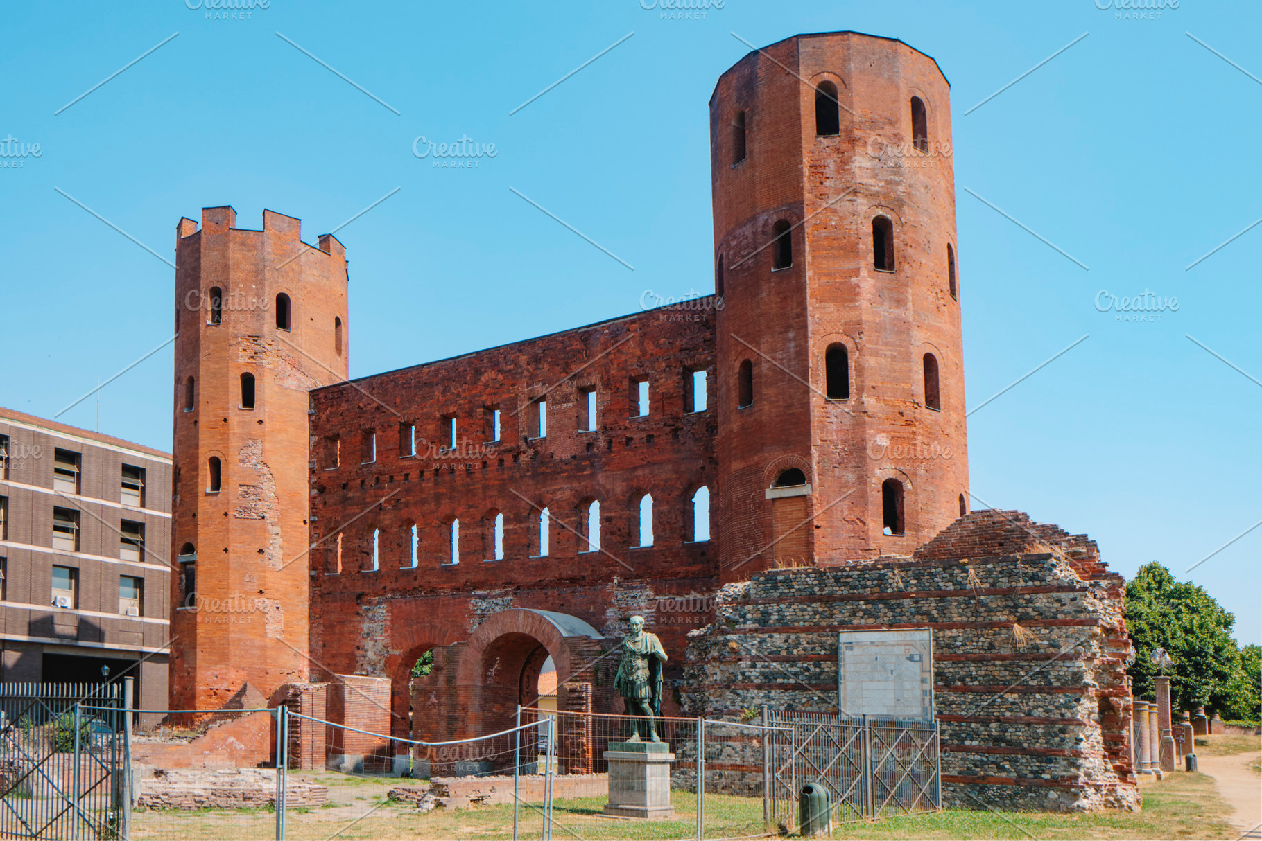 the Porta Palatina in Turin, with its towers, a Photo by Nito
