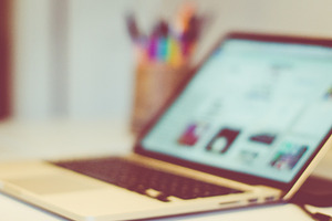 Laptop featuring freelancer, desk, and office