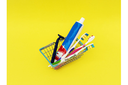 Colorful toothbrushes and toothpaste, a Health & Medical Photo by shahin.mammadov