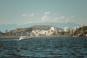 Speedboat Cruising by City Coast, a Sports & Recreation Photo by SkyNext
