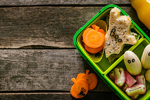 Halloween style school lunch box  containing lunch, box, and halloween