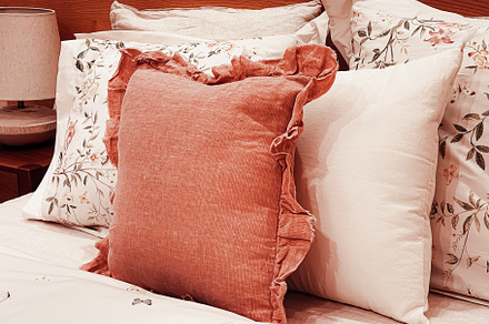 Vintage countryside style bedding with floral pattern on wooden, an Architecture Photo by Anneleven