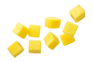 Mango cubes flying close-up on a, a Food & Drink Photo by innakreativ