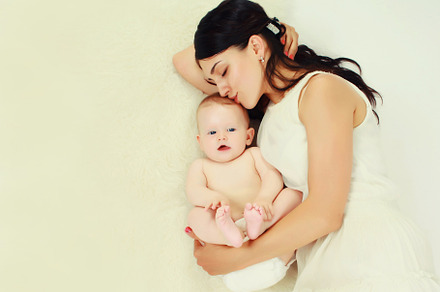 happy young mother lying with baby t, a Person Photo by Rohappy