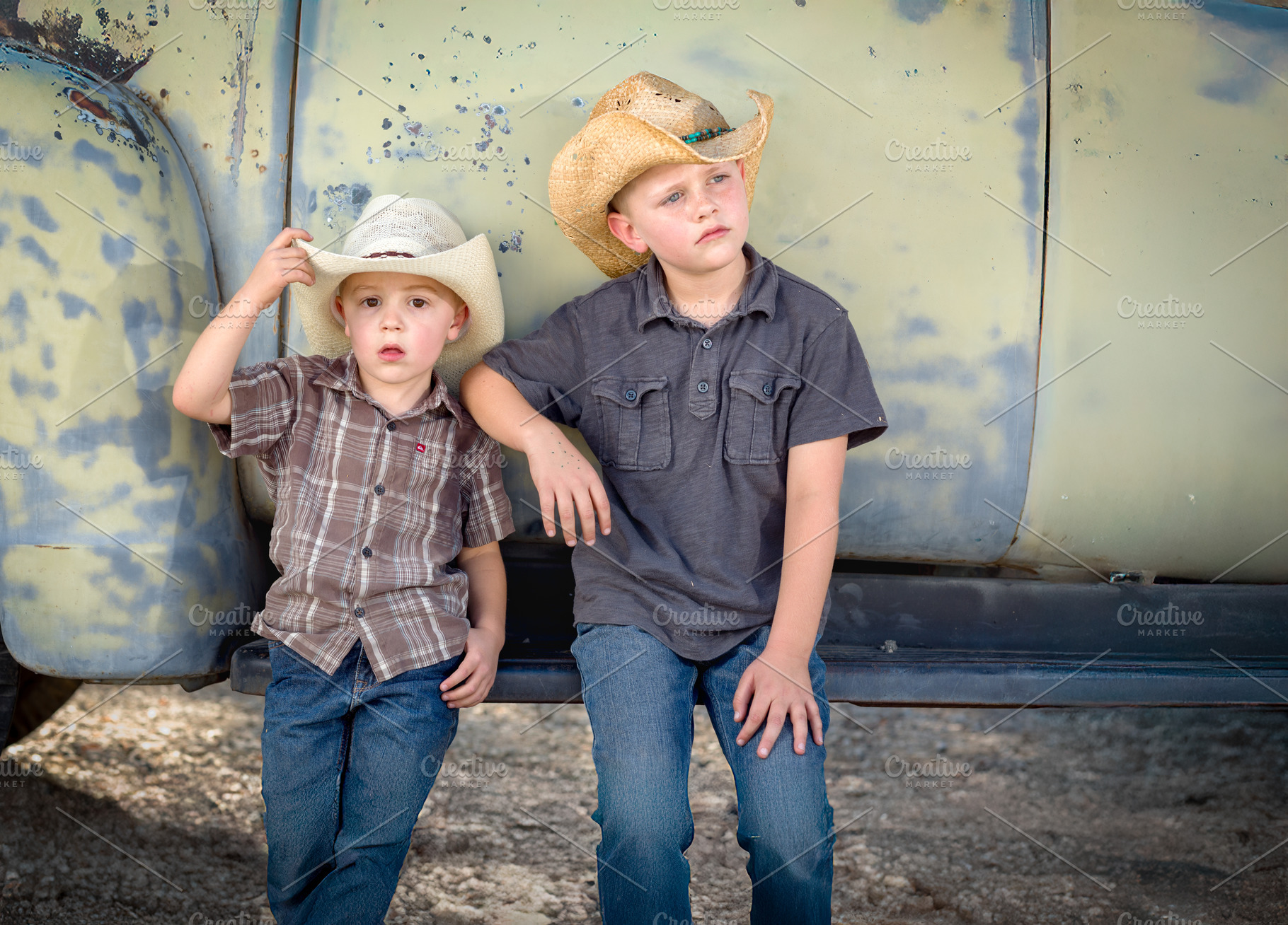Two Young Boys Wearing Cowboy Hats, a Holiday Photo by Andy Dean Photography