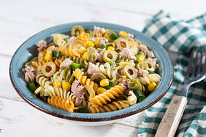 Pasta salad with tuna, corn and olives in bowl, a Food & Drink Photo by etorres69
