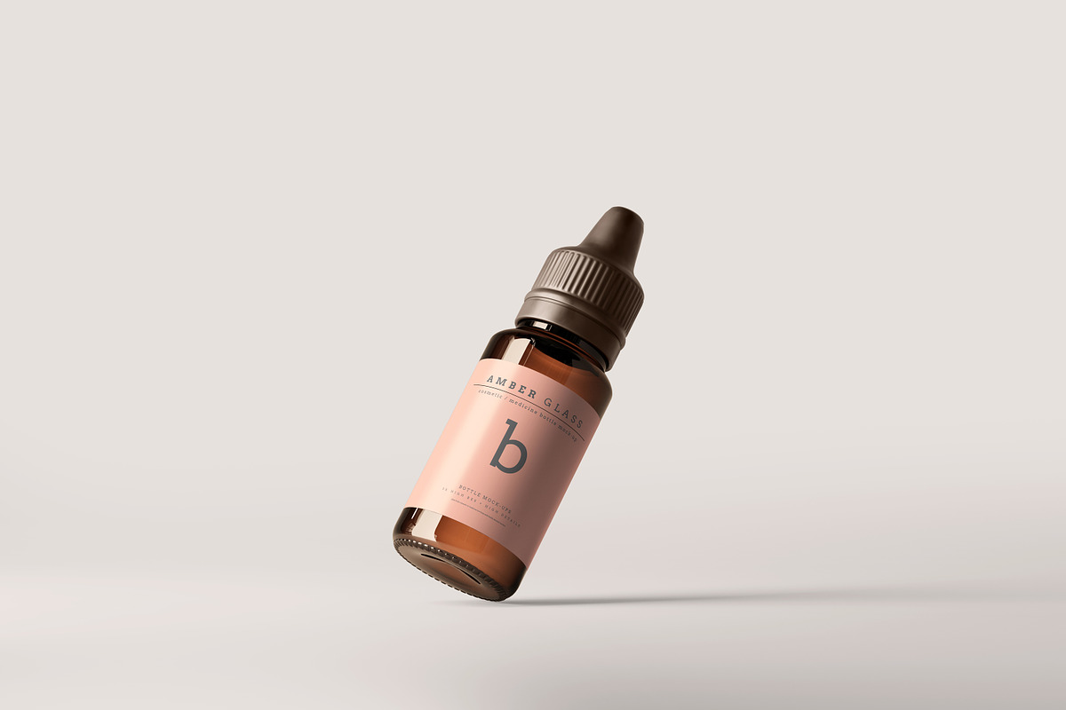 Amber Glass Dropper Bottle Mockups, a Cups & Container Mockup by pmvch (Photo 13 of 20)