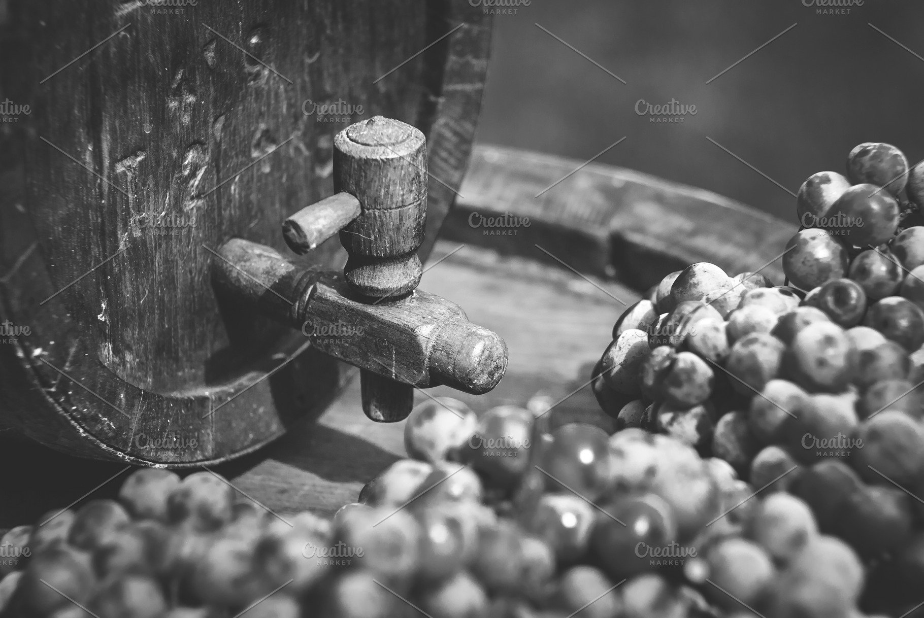 Vintage wine barrel with grapes, an Industrial Photo by Mark Borbely