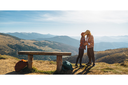 Couple of Hikers With Backpacks in