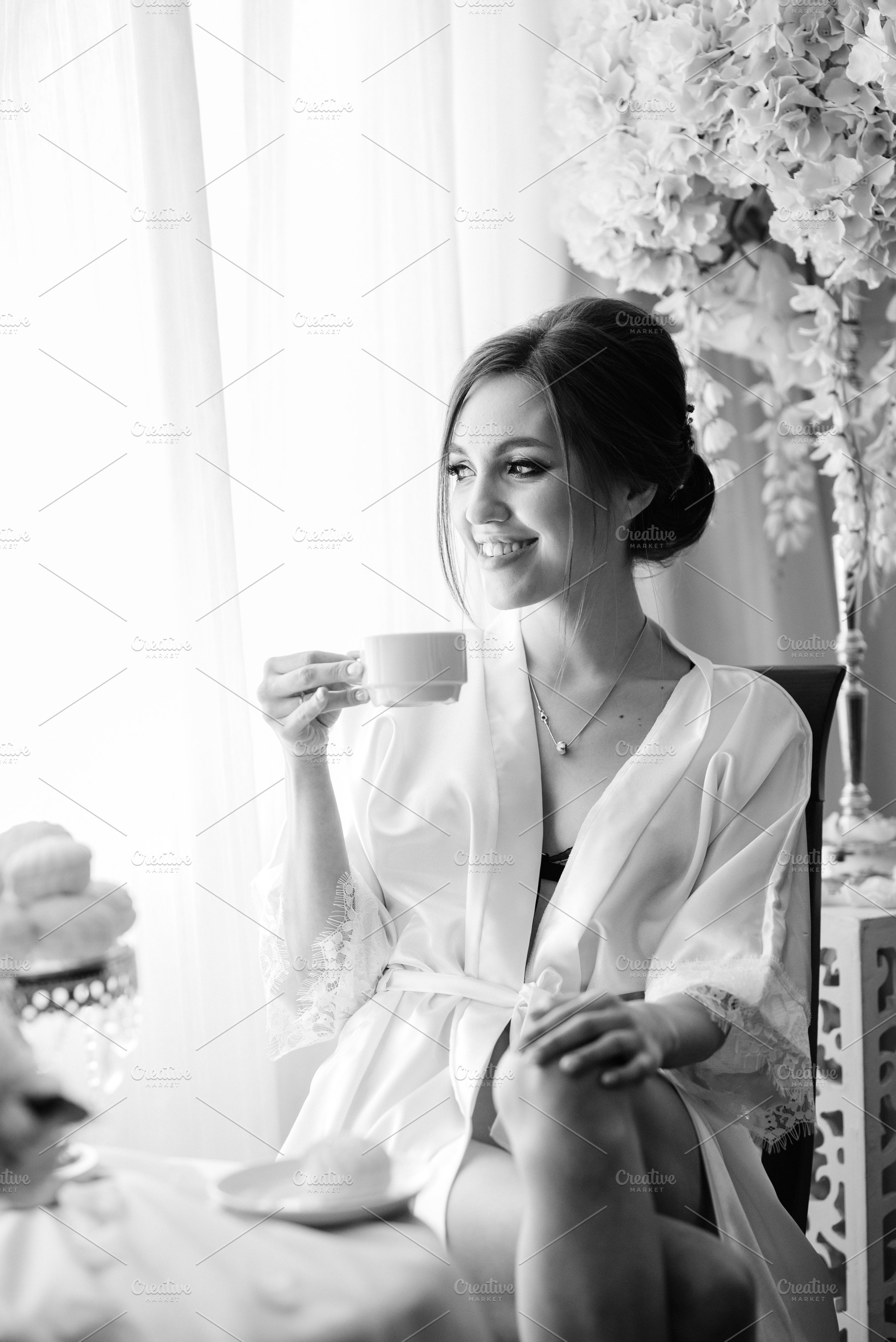 A young bride sits at a slot machine in the morning and drinks c, a Person Photo by Weddings, People, Travel