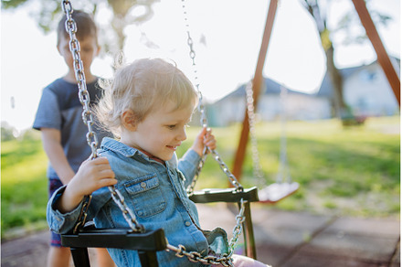 Little sibling playing together in, a Nature Photo by HalfPoint