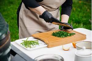 Chef preparing fresh chimichurri, a Food & Drink Photo by HalfPoint