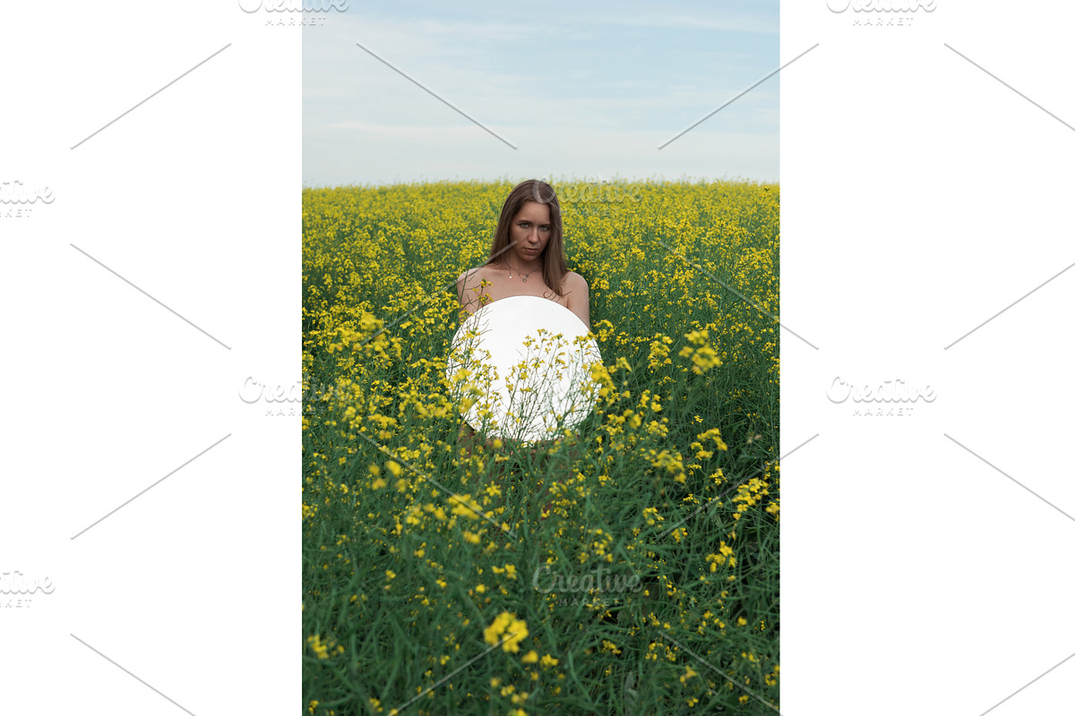 Artistic Woman Holding Mirror in, a Graphic by Jan Jack Russo Media