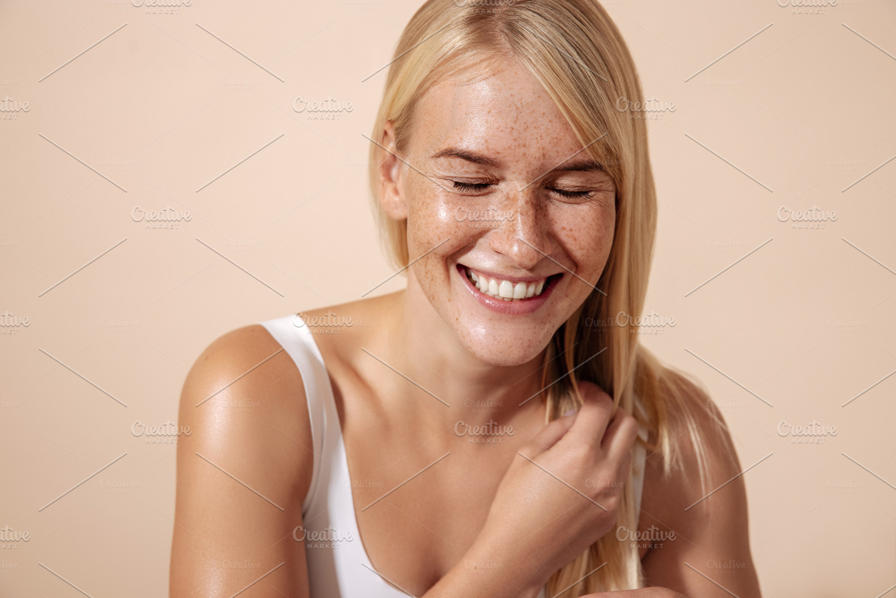 Studio shot of a happy woman, a Person Photo by Artem Varnitsin