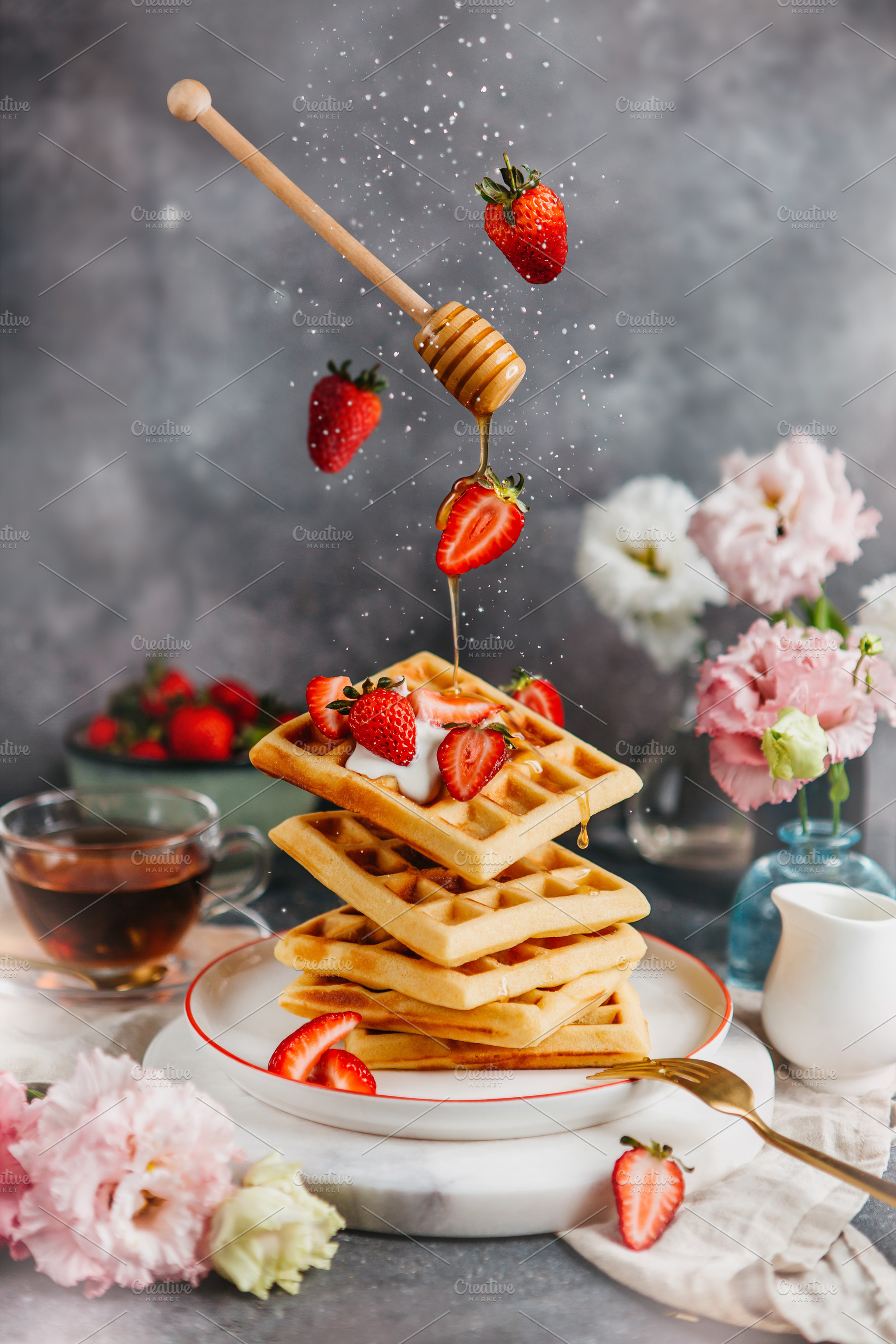 Levitating waffles with strawberries, a Food & Drink Photo by Fargana
