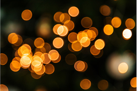 Yellow bokeh christmas on black, an Abstract Photo by yanadjana