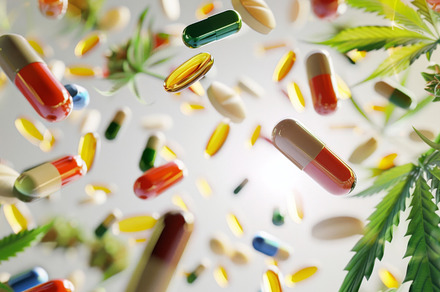 Colorful pills and cannabis leaves scattered on white background, a Photo by Dvoevnore photos