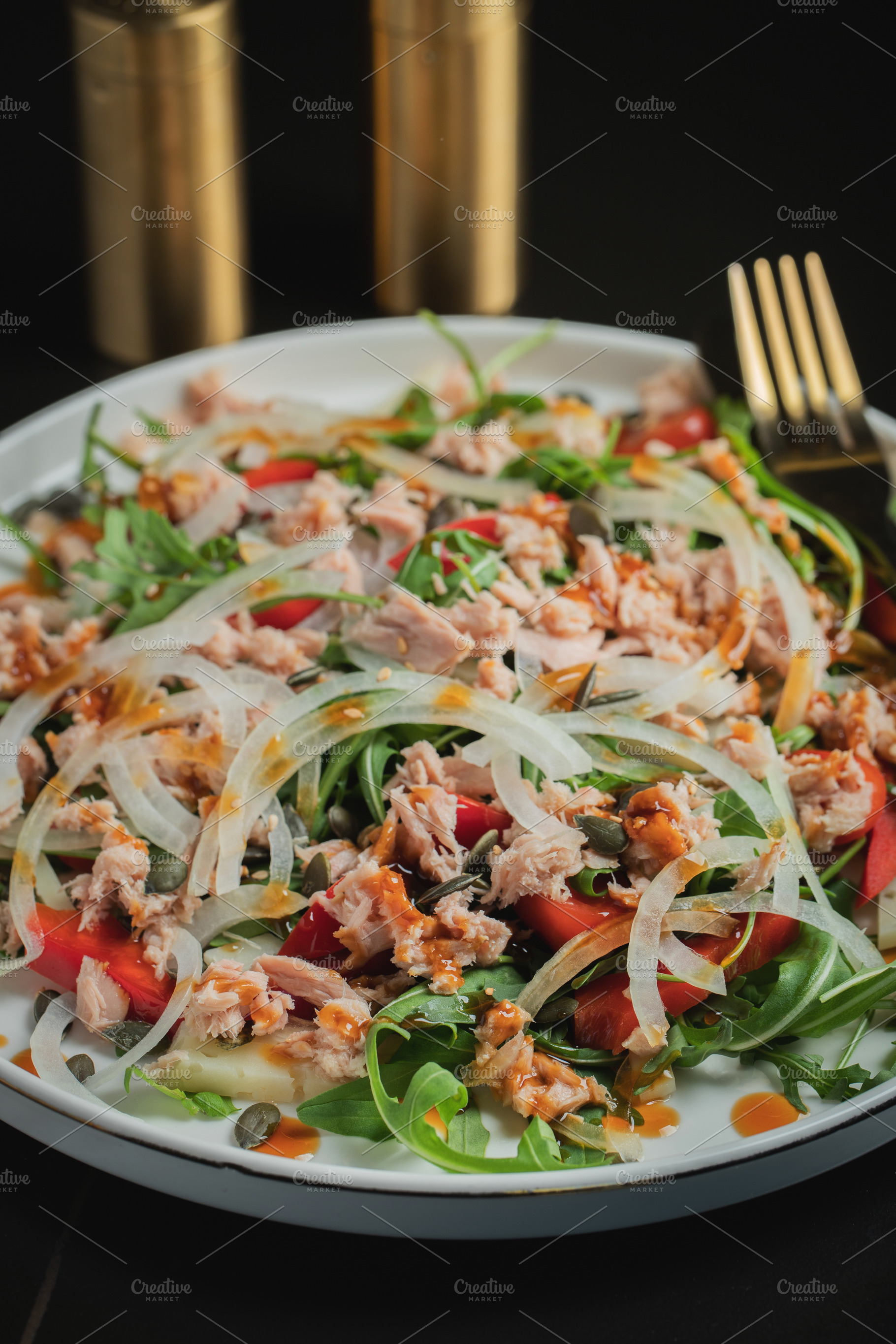 Fresh Tuna Salad with Onions and Cherry Tomatoes. Italian Mediterranean Cuisine, a Food & Drink Photo by Budarinphoto