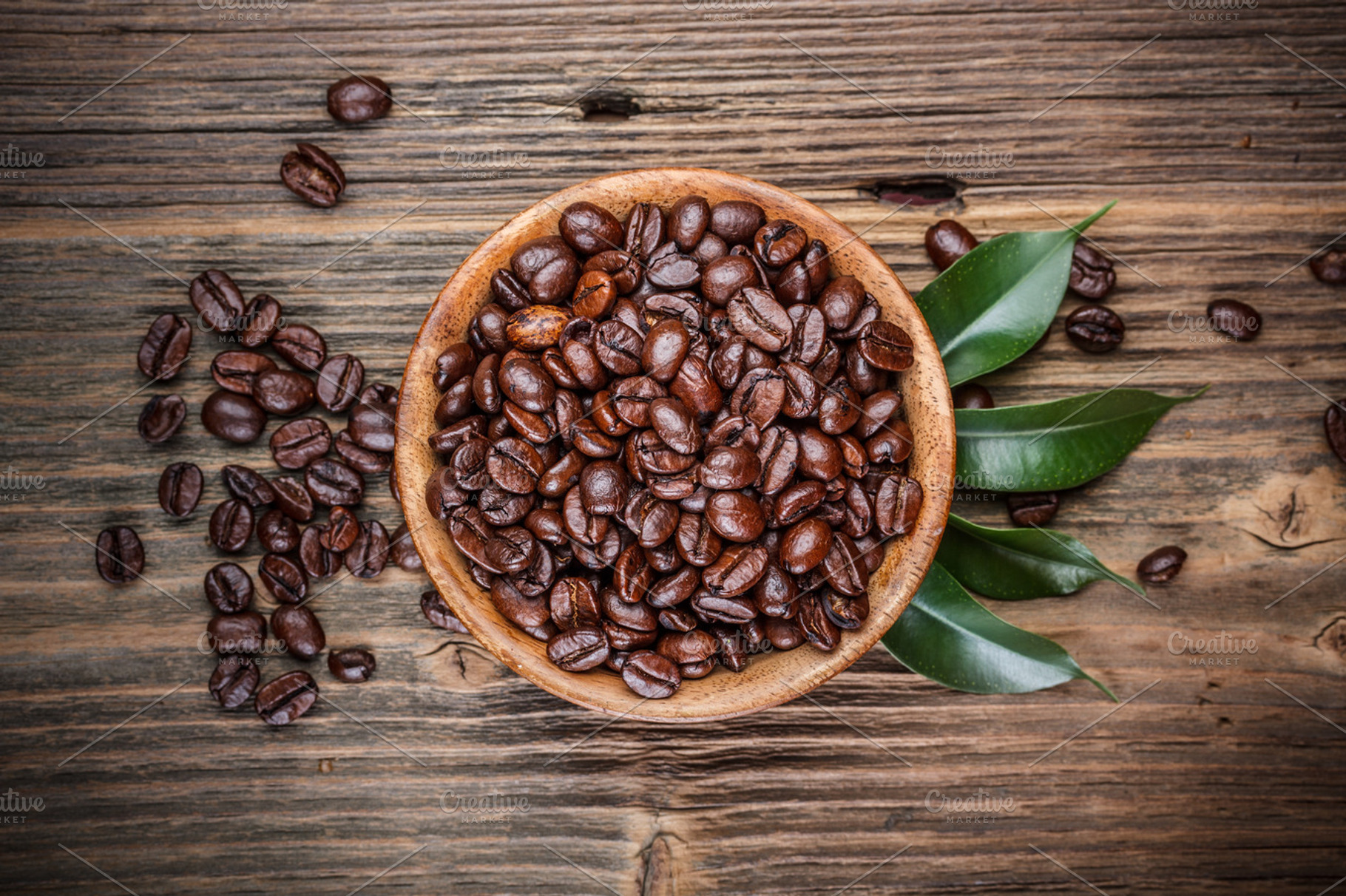 Coffee beans containing bowl, bean, and wooden
