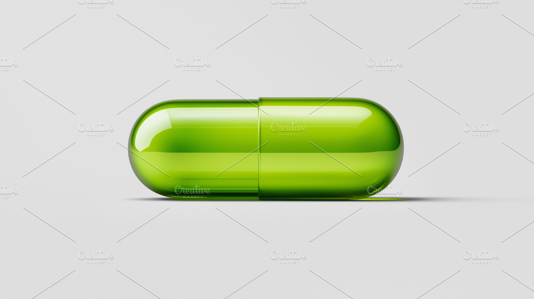 Green capsule pill lying on a light, a Health & Medical Photo by MistyDay