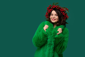 Smiling woman in green coat, a Person Photo by Elena Vagengeim